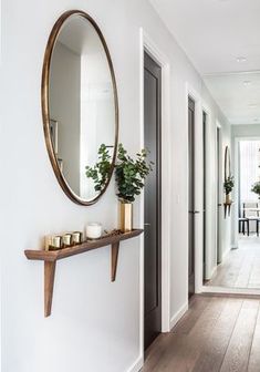 the hallway is clean and ready for us to use as an entrance way in this home