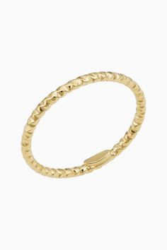 Add some texture to your stack with our Skyline Ring. This dainty diamond-cut band offers impressive shine as it catches the light from every direction. Pair it with other classic stackers or wear it solo. Metal: 14k Yellow Gold Dimensions: 1.5mm Width Weight: 0.5 Grams Solid Gold Origin: Crafted in Vicenza, Italy Adjustable Stackable Rings With Diamond Cut, Elegant 14k Gold Faceted Stackable Rings, Adjustable Yellow Gold Stackable Rings With Diamond Cut, 14k Gold Faceted Stackable Rings, Elegant Yellow Gold Faceted Stackable Rings, Faceted 14k Gold Stackable Rings, Gold Faceted Stackable Rings In 14k Gold, Adjustable 14k Gold Stackable Rings With Diamond Cut, Adjustable 14k Gold Diamond-cut Stackable Rings