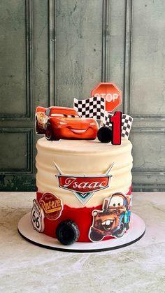 a birthday cake with cars on it