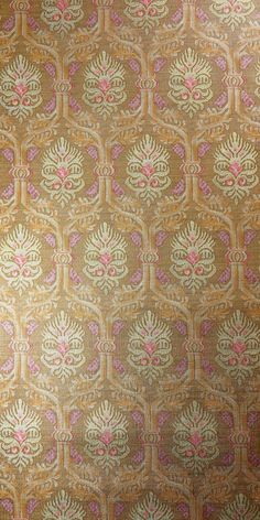 an old wallpaper with pink and gold designs