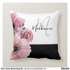 a pillow with pink flowers on it and the name makkama written in cursive writing