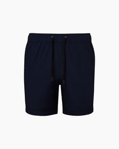 Cut with more length than Charles 5", the 7" still maintains the same refinement in its tailoring inspired by traditional swimwear. Quick-dry fabric makes it easy to wear after your swim — all you'll need is a simple shirt. Inspired by traditional swimwear tailoring Quick-dry fabric Inseam: 7" True to size. Casual Fitted Swimwear With Short Legs, Navy Fitted Swimwear, Navy Fitted Short Swimwear, Navy Short Length Swim Trunks, Fitted Cotton Swim Trunks For Poolside, Casual Fitted Shorts For Pool, Navy Casual Short Swimwear, Classic Navy Summer Bottoms, Simple Shirts