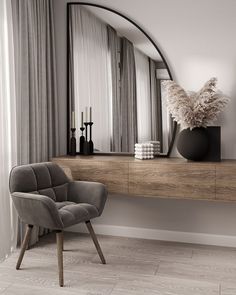 a chair sitting in front of a mirror on top of a wooden shelf next to a vase