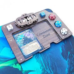 a close up of a board game with dices on the front and back cover