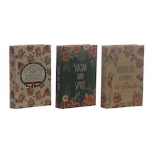 three boxes with different designs on them, one has a card saying sugar and the other is a recipe book