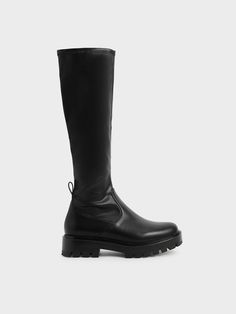 With a laid-back feel and day-to-night versatility, our black knee-high boots are this season’s silhouette to sport. Rendered in a classic match-all shade, featuring a gentle round toe and 4.5cm chunky heels, these boots will transform easy outfits into sophisticated fashion pieces. Top style tip: Try them out with a gingham shirt, leather skirt and a ruched bag for a vintage look, or break all the rules and wear them with jeans tucked in. Black Chunky Knee High Boots, Knee High Chunky Sole Boots, Black Knee High Boots Chunky, Long Black Boots Outfit, Black Leather Knee-length Boots, Black Chunky Platform Knee-high Boots, Fall Winery Outfits, Knee High Black Boots, Black Leather Knee-high Boots With Lug Sole