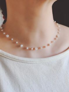 Next day shipping Small natural pearls and stars carved from shells form a very simple and cute little necklace for daily wear. * Material: High Quality Natual pearl and shell * The necklace is adjustable from 15.5  to 17.5 inches. Please don't hesitate to contact me with any questions at all. View more items in my shop      https://www.etsy.com/shop/TTanGadgets TTANGADGETS copyrights all images. All rights reserved Star Choker, Birthday Stone, Necklace Shell, Beads Craft Jewelry, Necklace For Her, Tiny Star, Jade Necklace, Necklace Minimalist, White Necklace