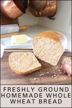 a loaf of bread sitting on top of a wooden cutting board