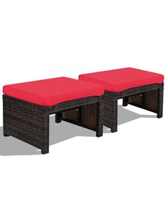 two brown wicker benches with red cushions