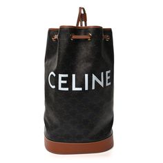 This is an authentic CELINE Triomphe Canvas Calfskin Medium Sailor Bag in Tan. This sleek tote is beautifully crafted of coated canvas with golden brown leather trim. The bag features cinch brown leather shoulder straps and a white Celine logo on the front.  The top is open to a brown fabric interior. High-end Brown Coated Canvas Bag, Designer Bags With Coated Canvas And Leather Lining, Designer Coated Canvas Satchel Bucket Bag, Designer Coated Canvas Bags With Leather Lining, Brown Signature Coated Canvas Bag For Errands, Designer Coated Canvas Bucket Bag For Shopping, Luxury Brown Satchel Bucket Bag, Modern Brown Coated Canvas Bucket Bag, Brown Bags With Leather Handles In Signature Coated Canvas