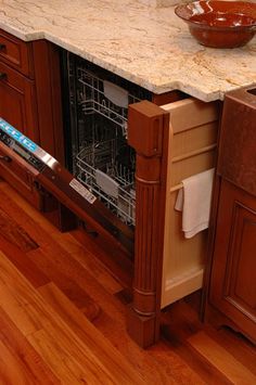 the dishwasher is open and ready to be used in the kitchen or dining room