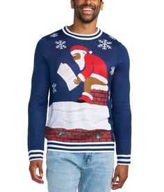 a man wearing a christmas sweater with santa clause on it