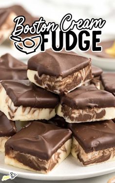 chocolate and marshmallows are stacked on top of each other with the words boston cream fudge in the background