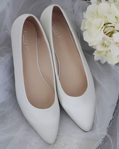 Elegant, chic with simplicity satin pointy toe ballet flats. Comfortable wear throughout your special day or to change into to dance the night away. Perfect for holiday party, night out and wedding party. DETAILS:COLORS AVAILABLE: White, Ivory, Champagne, Blush Pink, Royal Blue and Aqua BlueUPPER: Synthetic upper and liningMATERIALS: Mandmade outsole Not sure of which size to purchase? Shoes measurements are as follow:(Please note measurements taken the length of inside of shoe from toe to heel) Classic Wedding Shoes, Quinceanera Shoes, Bridesmaids Shoes, Wedding Shoes Sandals, Flower Girl Shoes, Glitter Flats, Wedding Flats, Pointy Toe Flats, Lace Up Flats