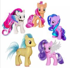 four little ponys with different colors and designs