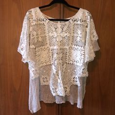 Free People Boho Crochet Poncho. So Sexy! Wear It Over A Bra Letter As A Sexy Top With Shorts Or Dressier Bottoms For A Night Out. Or, Throw It Over A Bikini At The Beach. An Absolute Stunner! I Just Don’t Wear It That Much Anymore. In Perfect Condition! White Crochet Lace Top For Beach Cover-up, White Open Knit Lace Top, White Lace Top With Open Knit Detail, White Open Knit Lace Top For Beach, White Lace Tops As Beach Cover-up, White Lace Tops For Beach Cover-up, White Lace Top For Beach Cover-up, White Crochet Trim Top For Beach, White Crochet Lace Top For Beach