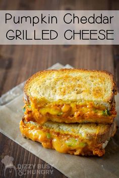 two grilled cheese sandwiches stacked on top of each other with the words pumpkin cheddar grilled cheese