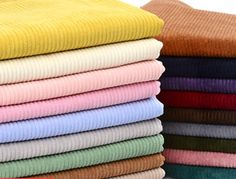 several folded towels stacked on top of each other