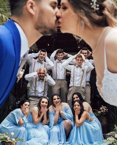 a group of people that are standing in front of each other with their faces close together