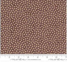 brown and white polka dot print fabric