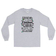 The best way to spread Christmas Cheer.... you know the rest. This tee is in honor of Buddy the Elf, always cheery, Christmas-y and singing. Truly one of our favorite new Christmas movies, Elf has so many fun lessons we just couldn't help wearing this gem of quote this holiday season. Be sure to spread a little Christmas cheer wherever you go! Singing helps. Shirt Reads: The Best Way to Spread Christmas Cheer is Singing Loud for All to Hear Christmas Movie: Elf Christmas Movie Character: Buddy t Christmas Movie Characters, Cricut Business, Christmas Movie Shirts, Christmas Long Sleeve Shirts, Tee Ideas, Elf Shirt, Elf Movie, Buddy The Elf, Elf Christmas