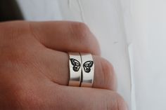 Butterflies represent change, and the courage to embrace a transformation that makes life better. Beautifully crafted butterfly rings make the perfect symbol of friendship. Show your bestie how much they mean to you with this stunning matching jewelry set. Make your connection unique with these butterfly best friend rings. Stunningly crafted from high-quality materials, this Butterfly Ring Set is the perfect way to show your best friend how much you care. Featuring two intricately detailed butte Butterfly-shaped Sterling Silver Jewelry For Wedding, Dainty Butterfly Charm Rings, Dainty Rings With Butterfly Charm, Dainty Butterfly Rings With Charm, Minimalist Butterfly Ring As A Gift, Minimalist Butterfly Ring As Gift, Dainty Adjustable Butterfly Promise Ring, Minimalist Butterfly Ring For Gift, Adjustable Butterfly Charm Jewelry For Wedding