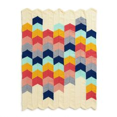 the colorful chevron pattern is on top of the white background, and it appears to be made out of fabric