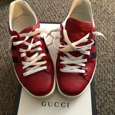 Mens Low Top Gucci Sneakers (Box Only Included If It Can Fit In Pre Paid Shipping Box.) Designer Gucci Sneakers With Embossed Logo, Designer Gucci Custom Sneakers With Rubber Sole, Gucci Designer Custom Sneakers With Rubber Sole, Designer Gucci Low-top Custom Sneakers, Gucci Leather Sneakers With Red Sole, Red High-top Gucci Sneakers, Gucci Red High-top Sneakers, Designer Red Sneakers With Branded Heel, Designer Red Sneakers With Branded Heel Counter