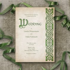 a wedding card with green ribbon and ribbons around it