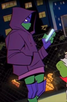 the teenage mutant is looking at his cell phone while standing in front of another teenage mutant