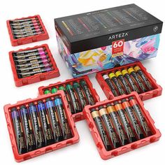 the box is full of markers and pencils