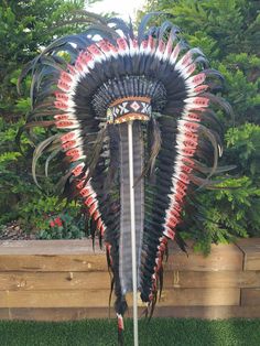 Long Indian Headdress Replica made with Brown Swan feathers and Rooster feathers beaded work in the front This great adult headdress is entirely handmade and truly adorable. Perfect photography prop for your special ocasion. Ties in the back for a perfect fit. This will be precious for your costume, or even room decor. Head circumference: 59 centimeters / 23 inches ✈️ Worldwide shipping 🐤 I only use authentic feathers ⛺️ I guarantee highest quality, 100% hand-crafted Festival Ostrich Feather Trim Headpiece, Festival Headpiece With Ostrich Feather Trim, Ostrich Feather Trim Headpieces For Festivals, Native American Wedding Dress, Swan Feathers, Native American Wedding, Native American Headdress, Beaded Work, Feather Fashion