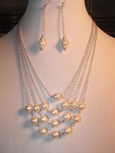 "This faceted shell pearl & crystal necklace on silver chains would look beautiful on a bride or bridesmaids in the wedding.  Made from the finest shell pearls and a rhinestone bar fastener .  The longest chain measures 18\" and the earrings are 3\" long from top of earwire.  Pearls are timeless and this set is very classy and will go with anything!" Crystal Necklace Beads, Rhinestone Chain Jewelry Diy, Formal Silver Pearl Backdrop Necklace, White Pearl Chain Jewelry For Mother Of The Bride, White Pearl Necklace For Bridal Shower, Elegant Pearl Jewelry For Bridal Shower, Mother Of The Bride Pearl Drop Jewelry, Pearl White Jewelry With Pearl Drop For Bridal Shower, Pearl White Pearl Drop Jewelry For Bridal Shower