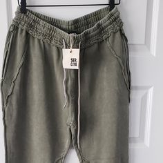 Nwt: Ser.O.Ya Trent Jogger Size Xxl Color: Forest Green Lightly Faded Sweatpants With Side Pockets And Drawstring Tie Waist. Tapered Ankles With Topstitched Detailing Throughout. Pair With Positive Energy. 100% Cotton Drawstring Waist Style No. Sr03-4029 These Are A Great Pair Of Unisex Joggers At A Great Price! Ser.O.Ya Is A New York-Based Contemporary Brand With A Purpose That Transcends Fashion. Through A Collection Of Unconstrained, Gender-Optional Designs, Ser.O.Ya Aims To Be A Vessel For P Social Movement, Good Energy, Positive Energy, Forest Green, Drawstring Waist, Mens Pants, Sweatpants, Forest, Man Shop