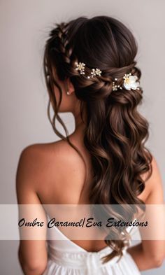 a woman with long brown hair wearing a flowered headband and white dress, back view