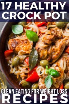 a bowl filled with chicken and vegetables on top of a table