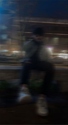 a blurry photo of a person riding a skateboard