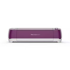 a purple toaster sitting on top of a white table