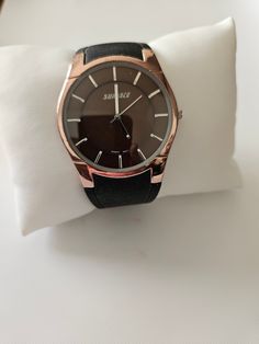 This is a very nice simple easy to read and very clean Surface quartz lightweight watch With an adjustable watch band. keeps very accurate time and comes with a new battery Mens Wrist Watches, Travel Alarm Clock, Wristwatch Men, Wrist Watches, Music Box, Gifts For Men, Watch Band, Quartz Watch, Watch Bands