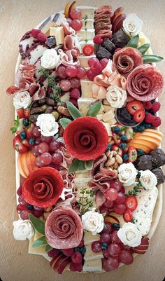 a platter filled with lots of different types of food