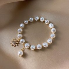 Description: Look great, feel wonderful and sophisticated, wearing this women's fashion elegant stylish luxury statement flower design premium quality simulated pearl bracelete jewelry. You will have lots of ways to enjoy this gorgeous, versatile and beautiful bracelet jewelry with your variety of outfits. Awesome to wear for special events like weddings, engagement parties, birthday celebrations, banquet dinners, dates and more, and also an excellent choice as a gift to you or to your loved one Pearl Bracelet Jewelry, White Pearl Bracelet, Pattern Animal, Pave Setting, Mood Tracker, Pearl Chain, Pendant Bracelet, Bracelet For Women, Love Bracelets