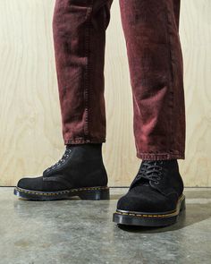 The Original Dr. Martens boot reimagined with a soft to touch, rich textured E.H. Suede. A timeless silhouette Goodyear welted to a rugged smoke sole. 10-eye lace up and classic AirWair heel hoop complete the look. No breaking in necessary, street ready straight from the box Doc Martens 101 Outfit, Lace Up Boots Men, Mens Dr Martens, Dr Martens 1460 Pascal, Breaking In, Boots Uk, Combat Boot, Suede Lace, Goodyear Welt