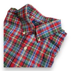 Elevate Your Casual Wardrobe With This Polo Ralph Lauren Men's Performance Plaid Oxford Shirt In Size 2xl. The Classic Fit, Collared Neckline, And Button-Down Closure Make It A Versatile Addition To Any Outfit. The Shirt Features A Stylish Plaid Pattern In Red, Green, And Blue, And Is Made Of High-Quality Cotton Material With A Woven Fabric Type. Perfect For Any Occasion, This Shirt Is A Must-Have For Any Fashion-Forward Man. Whether You're Dressing Up For A Night Out Or Dressing Down For A Casu Red Shirt With Button Closure And Casual Collar, Classic Red Top With Casual Collar, Red Collared Flannel Shirt, Classic Red Polo Collar Shirt, Classic Fitted Collared Flannel Shirt, Classic Red Top With Placket, Red Casual Shirt With Placket, Casual Red Shirt With Placket, Red Collared Shirt With Buttons