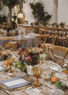 the table is set with place settings for dinner