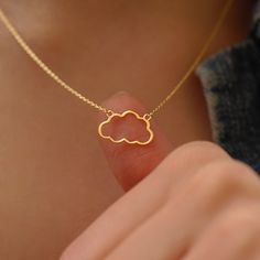 "Elevate her style with our exquisite 14K Solid Gold Cloud Necklace.  Crafted from solid 14K gold, this pendant necklace not only showcases its timeless beauty but also ensures its durability, making it a lasting symbol of your love and affection. Let her carry a piece of the sky with her wherever she goes with this dainty cloud necklace in gold. PRODUCT DETAILS * Material: 925 Sterling Silver, 14K Solid Gold (real solid gold, no gold-filled or no gold plated material)  * Choice of Gold Color: Yellow Gold, Rose Gold, White Gold  * Adjustable length  * Charm Length: 15mm, 10mm  * Closure: Spring ring  * Chain style: Cable  * Style: Minimalist Thinking of gifting? Elevate your order with our Christmas Gift Wrap option! 🎁 Buy from here! https://www.etsy.com/listing/1580219719/ M O R E F R O Unique Necklaces Silver, Girls Necklaces Jewelry, Cute Gold Necklace, Location Names, Cloud Jewelry, Cloud Necklace, Cloud Pendant, Gold Minimalist Jewelry, Christmas Jewellery