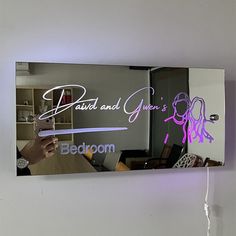 a person taking a selfie in front of a mirror with the words david and your's bedroom on it