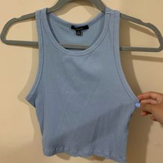 Blue Ambiance Crop Top, Size Medium (Fits A Small) Never Used But Has A Hole At The Side Cropped Blue Tank Top For Summer, Blue Cropped Tank Top For Summer, Blue Cotton Tank Crop Top, Blue Fitted Cropped Tank Top, Casual Blue Cropped Tank Top, Blue Tank Crop Top, Trendy Blue Cropped Tank Top, Trendy Cropped Blue Tank Top, Blue Ambiance