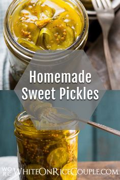 two jars filled with pickles sitting on top of a table next to a spoon