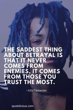 a man with blue dreadlocks on his face and the words, the sadest thing