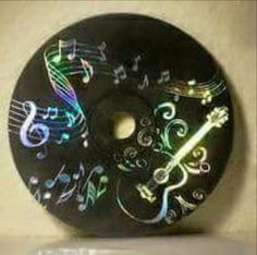 a clock with musical notes painted on it